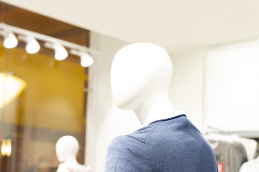 female mannequin face at a shop.