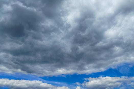 View from below. Blue sky with white clouds.