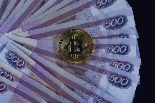 Russian paper money and bitcoin.