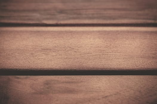 Dark wooden textured background. View from the front