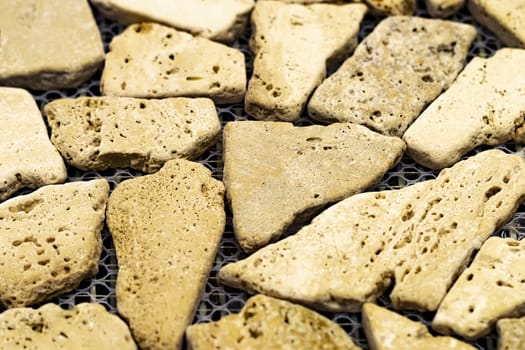 Stones light textural background. Blured