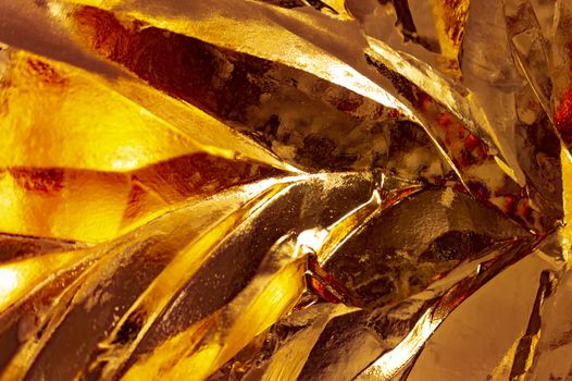 Yellow textured background made of ice
