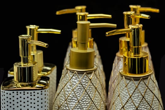 Cosmetic dispensers on a black background