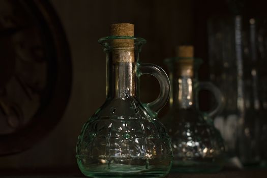 Glass vessels under olive oil.