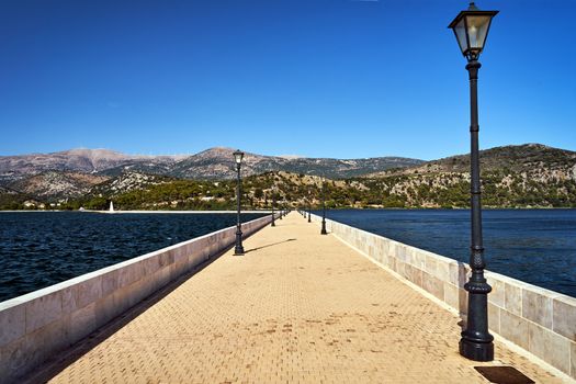 A stone bridge over the bay in the town of Argostoli on the island of Crete in Greece