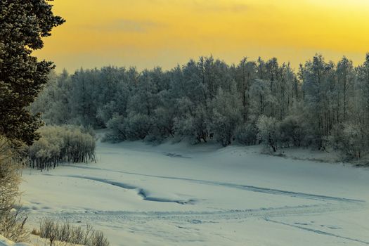 Sunset in winter in Siberia. Nature beautiful.