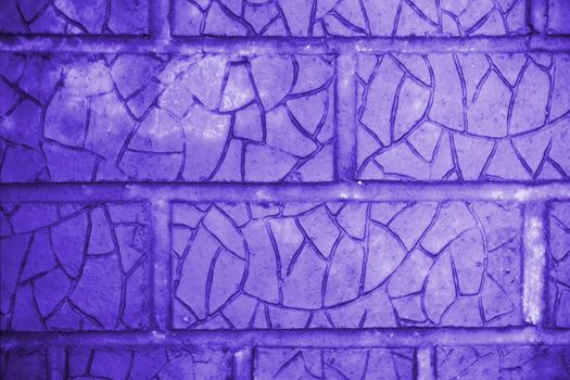 Blue cracked bricks. Wall building