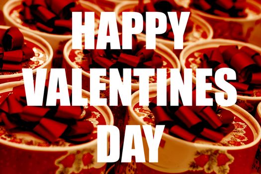 The inscription of Happy Valentine's Day on a festive background. Post card style.