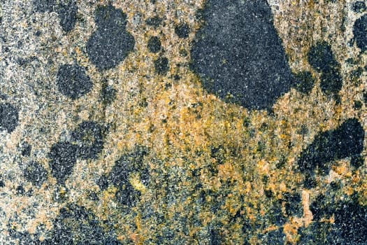 Rusty background with black spots. View from the front.