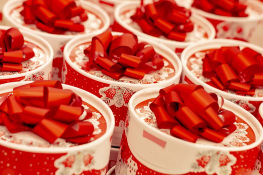 Round the boxes with bows on lid. Candys for love you. Winter