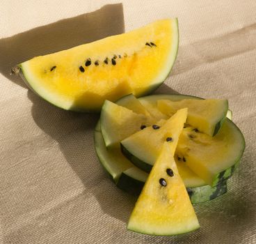 Yellow watermelon with slices and wedges for effective watermelon diet