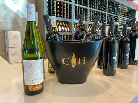 Naples, FL/USA - 10/30/20: Bottles of wine at a Coopers Hawk Wine bar and restaurant in Naples, Florida.