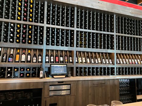 Naples, FL/USA - 10/30/20: Bottles of wine at a Coopers Hawk Wine bar and restaurant in Naples, Florida.