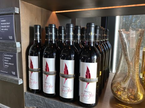 Naples, FL/USA - 10/30/20: Bottles of Sangria Red wine at a Coopers Hawk Wine bar and restaurant in Naples, Florida.