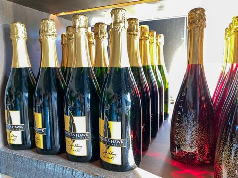 Naples, FL/USA - 10/30/20: Bottles of Sparkling Moscato wine at a Coopers Hawk Wine bar and restaurant in Naples, Florida.