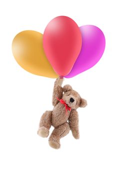A Teddy bear being carried away by colored balloons
