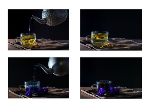 Set of butterfly pea tea and Chrysanthemum tea on wooden table and black background.