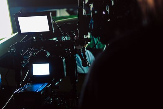 Film industry. Filming with professional camera background