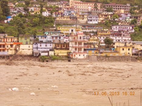 Himalayan tsunami or flood in Ganges India. The Ganges River has been heavily flooded in 2012 and 2013, causing widespread Destruction. High quality photo