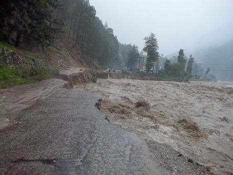 Himalayan tsunami or flood in Ganges India. The Ganges River has been heavily flooded in 2012 and 2013, causing widespread Destruction. High quality photo