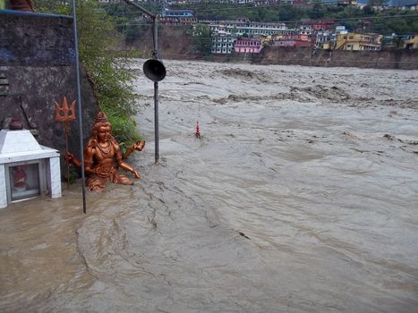 Himalayan tsunami or flood in Ganges India. The Ganges River has been heavily flooded in 2012 and 2013, causing widespread Destruction. High quality photo