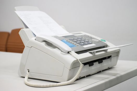 The fax machine for Sending documents in the office concept equipment needed in office 