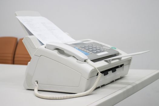 The fax machine for Sending documents in the office concept equipment needed in office 