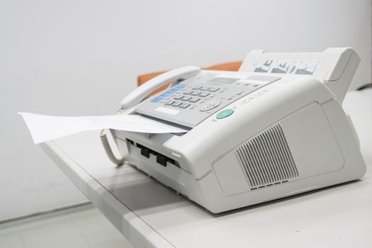 The fax machine for Sending documents in the office concept equipment needed in office 