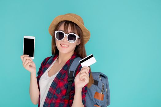 Beautiful portrait young asian woman wear travel summer fashion holding credit card and smart mobile phone in summer, asia girl payment for booking internet online with app in vacation.