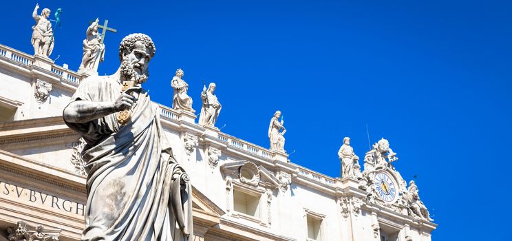 Detail of Saint Peter statue located in front of Saint Peter Cathedral entrance in Rome, Italy - Vatican City