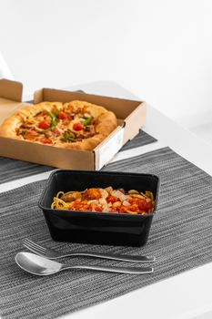 Set lunch, pizza with pasta. Food delivery.