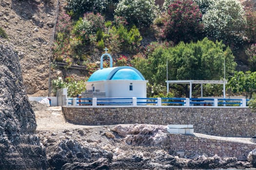 Church with blue roof near Stegna on the eastside of  Rhodes island, Greece