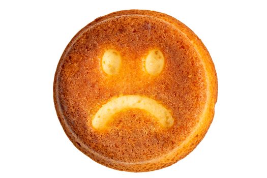 unhappy face biscuit cookie isolated on white in flat lay perspective.