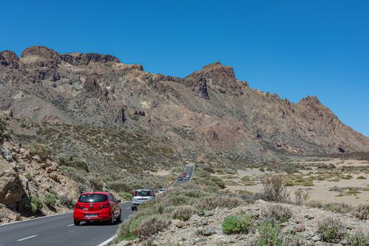 Spain, Tenerife - 05/10/2018: Traffic on a mountain road in the vicinity of the Teide volcano. Stock photography