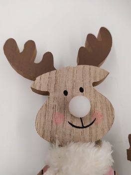 Festive decorations in the covid period of Christmas 2020, reindeer in wood