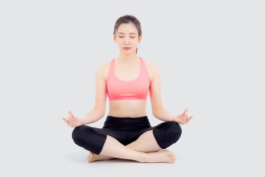 Beautiful portrait young asian woman sitting yoga, asia girl health care with workout fitness relaxing with active exercise isolated on white background, healthy and wellbeing concept.