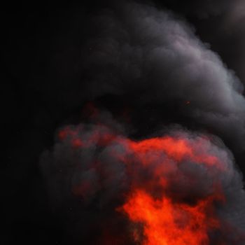 Dangerous flames of strong red fire and motion dramatic clouds of black smoke covered sky. Defocus, motion blur from fire and high temperature from flames. Atmospheric and smoke dispersion.