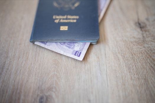 Picture of the corner of a Two Honduran Lempiras Bill shown from inside a United States of America Passport