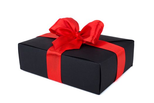 Black friday gift, paper box with red silk ribbon bow isolated on white background