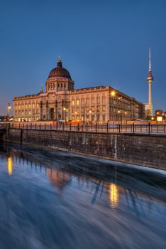 The reconstructed Berlin Palace with the Television Tower at night