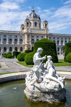 The Natural History Museum with a small fountain in Vienna, Austria