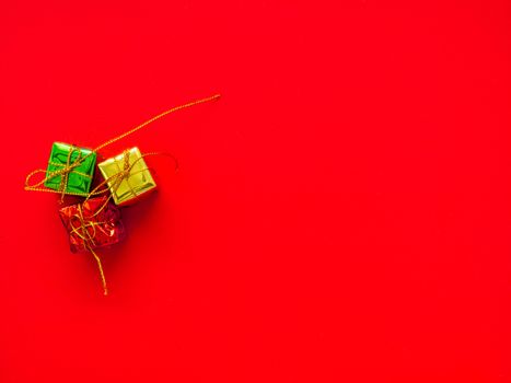 Christmas tree decorations, gift boxes, ball drop
On a red background To beautify the Christmas tree