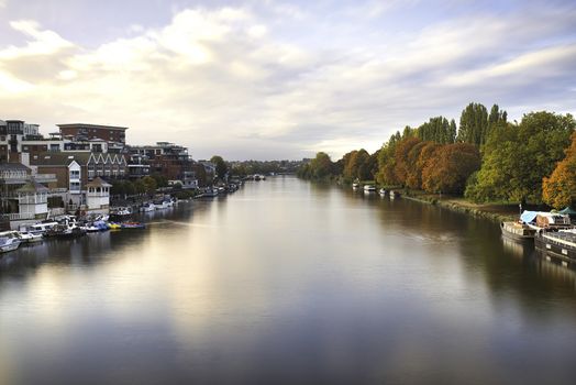 Aerial Landscape Photo Under a Cloudy sky and Over the River Thames, which Divides a Town and a Forest