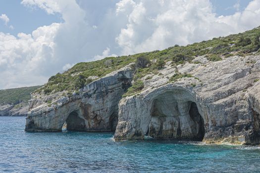 Seascape. Caves in the rocks of the coastline on the island of Zakynthos (Greece). Stock photo