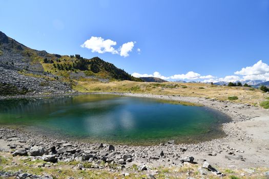Lake Chamolé, a small alpine lake above Pila in the Aosta valley
