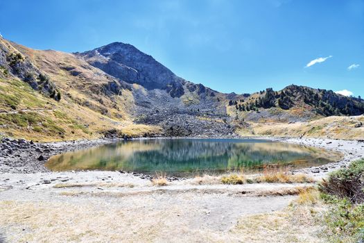 Lake Chamolé, a small alpine lake above Pila in the Aosta valley