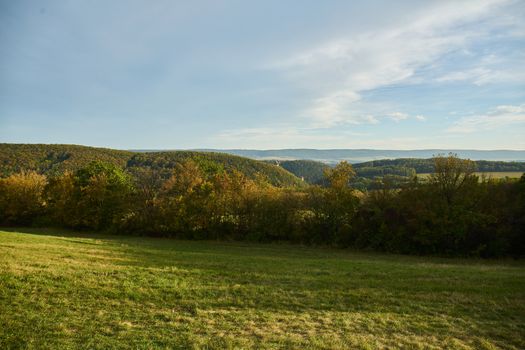 panorama view of hilly countryside pastures and forests