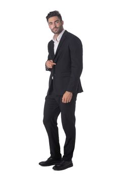 Full length portrait of young handsome business man in black suit studio isolated on white background