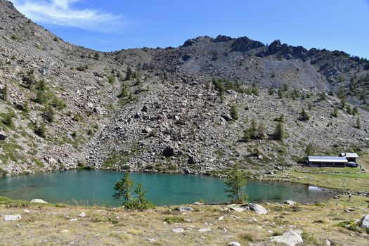 Lake Muffè, a small and colorful alpine lake, above Champorcher