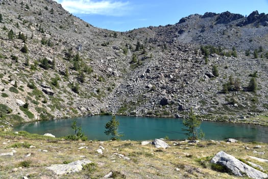 Lake Muffè, a small and colorful alpine lake, above Champorcher